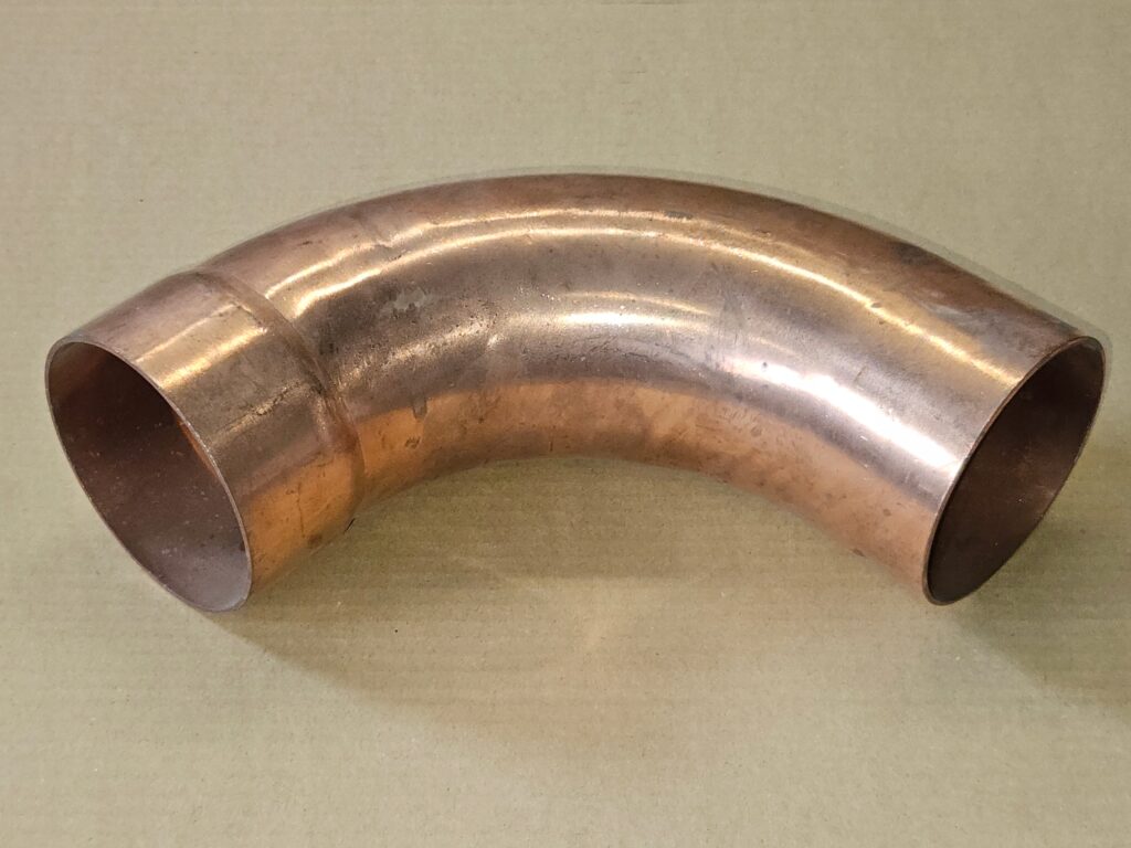 Łuk miedziany nyplowy 89,0mm, 90 stopni, Cu, LZ x LW, długi